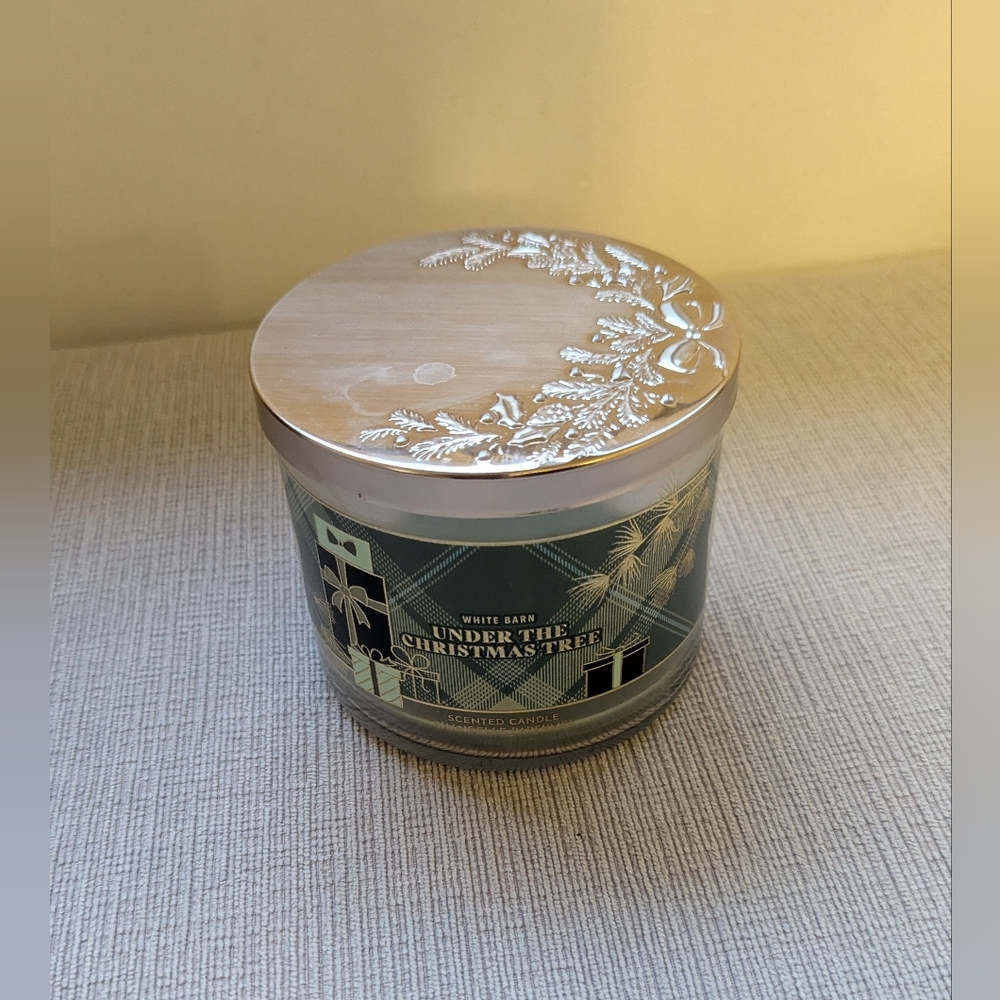 Empty Candle Holder with Festive design. Metal lid with holiday embellishments.